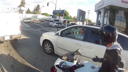 Crazy Guy hits motorcyclist Road Rage