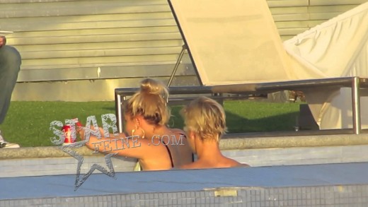 **Exclusive Full Video** Justin Bieber cozies up to Hailey Baldwin in his Beverly Hills pool.