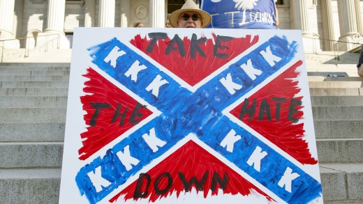 Protesters Demand the Confederate Flag Be Taken Down