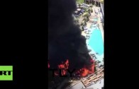 Fire rages at Cosmopolitan hotel, huge plumes of black smoke fill Las Vegas skyline