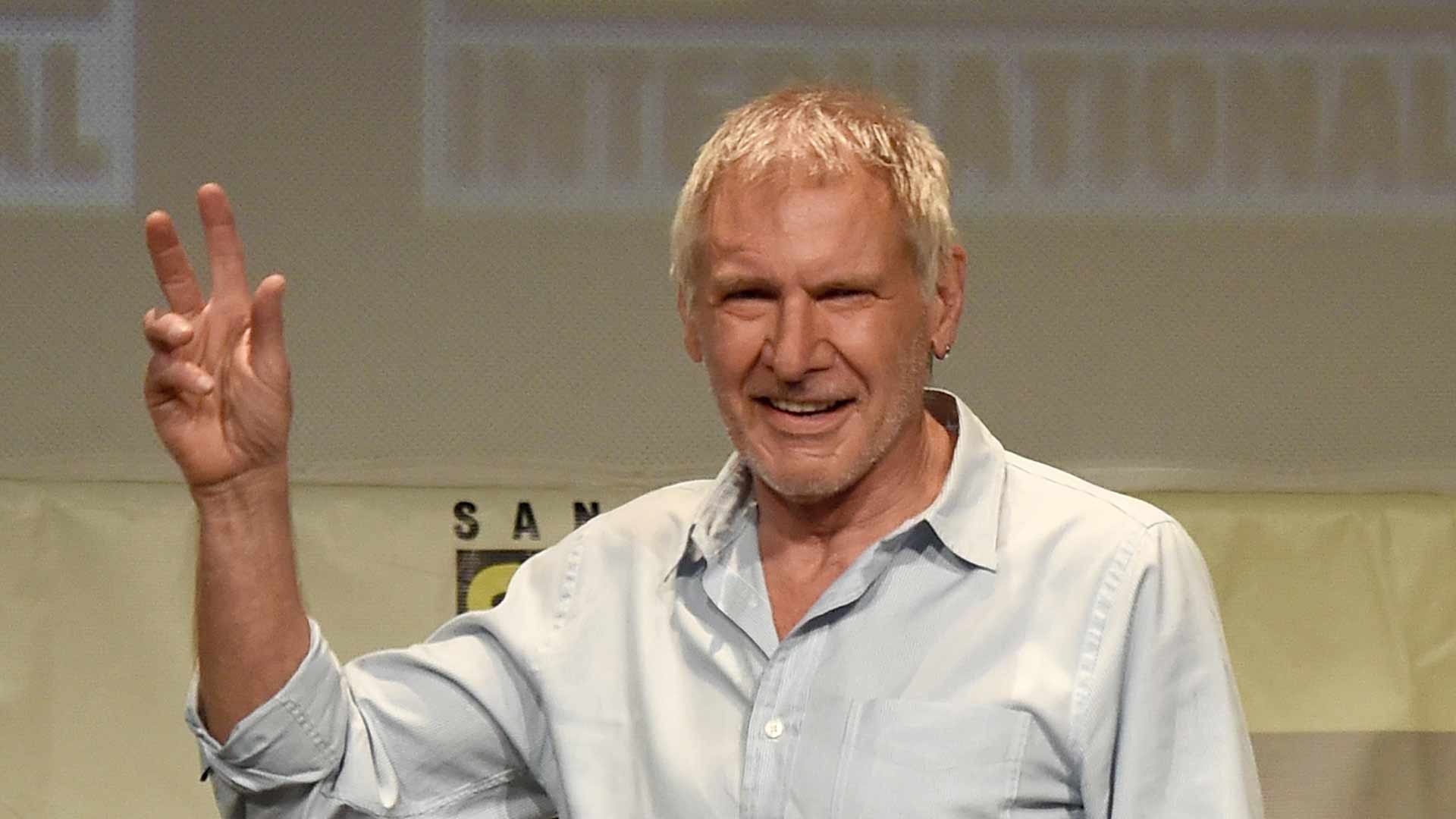 Harrison Ford Arrives on Stage at ComicCon for Star Wars The Force