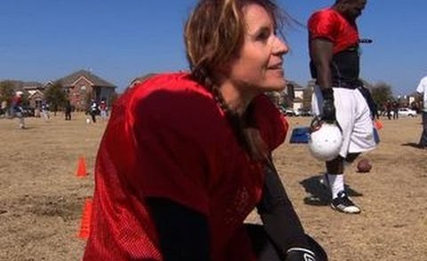 Woman breaks record as first pro-football player
