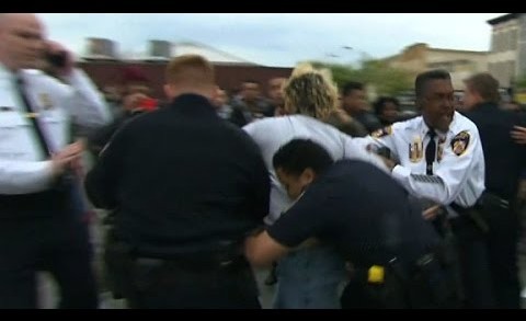 Baltimore police, protesters clash