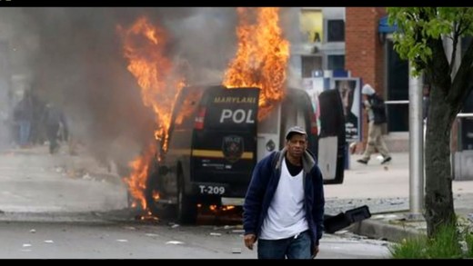 Baltimore Riots: Footage of Cars Torched, Stores Looted After Freddy Gray Funeral