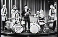 Betsy plays drums (IGaS 4/19/61)