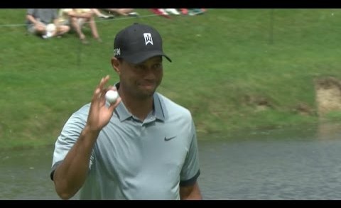 Tiger Woods converts his 18-foot putt for birdie at the Memorial